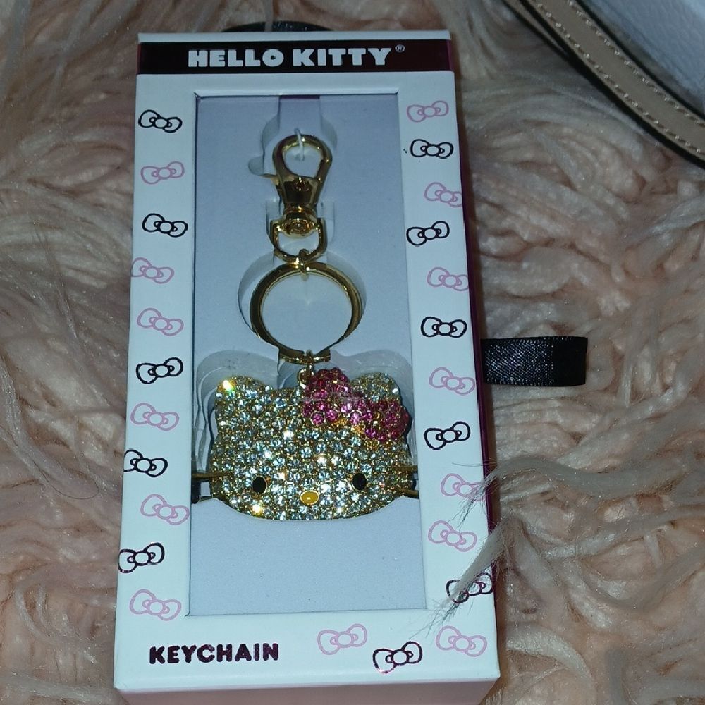 NWT Hello Kitty Glittery Gold and Pink Keychain